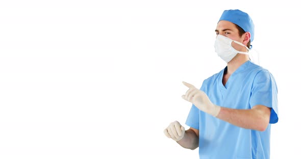 Surgeon pretending to be using futuristic digital screen alt