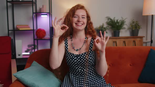 Happy Cheerful Redhead Woman Looking Approvingly at Camera Showing Ok Gesture Positive Like Sign alt