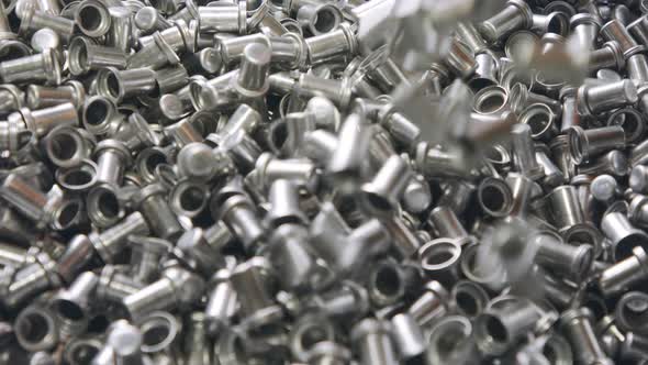 Metal parts in a modern industrial production line alt