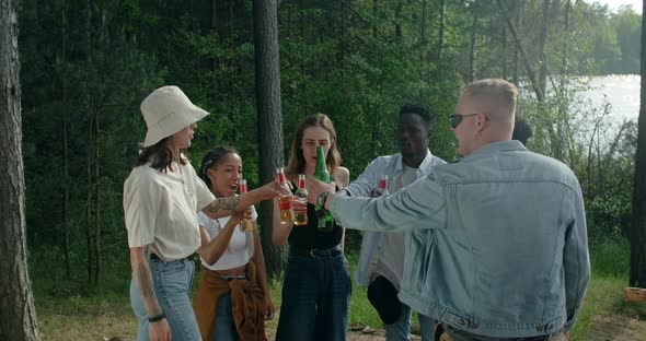 Young African and European Friends are Having Party in Forest Summer Camping  60p Prores