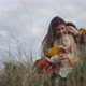 Happy Couple of Lesbians Sitting in Embrace with Daughter - VideoHive Item for Sale