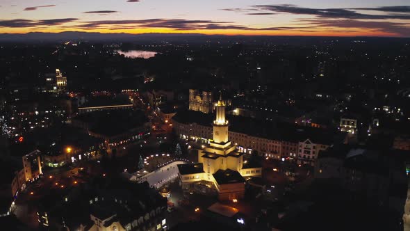 Aerial Sunset View of the Center of Ivano Frankivsk City in the Evening, Ukraine. Old Historical