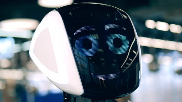 Futuristic Bot Expressing Emotions on Its Face alt