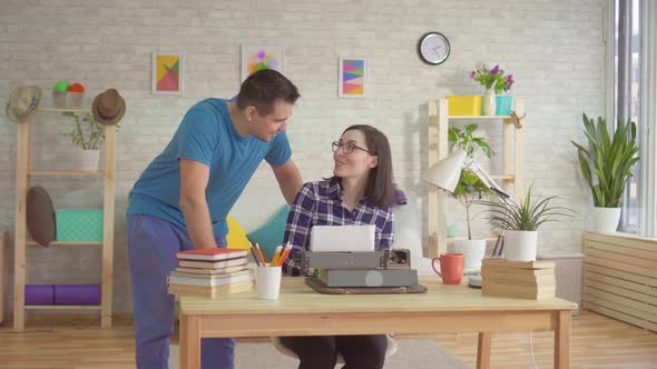 Young Writer Writes on an Old Typewriter To Her Suitable Young Man alt