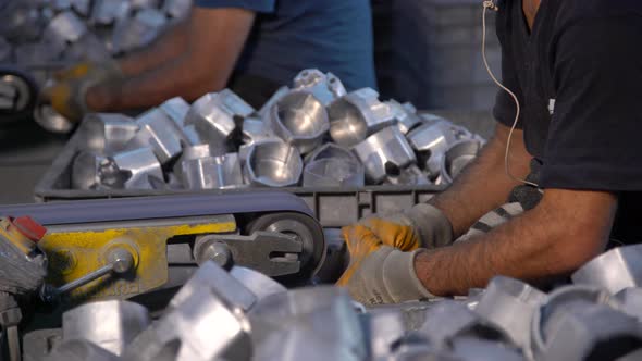 Workers Grind Aluminum Engine Molds By Hand  In Factory