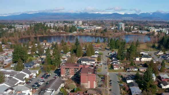 A Stunning Aerial Shot of Mill Lake Park in Central Abbotsford BC Canada on a Sunny Day alt