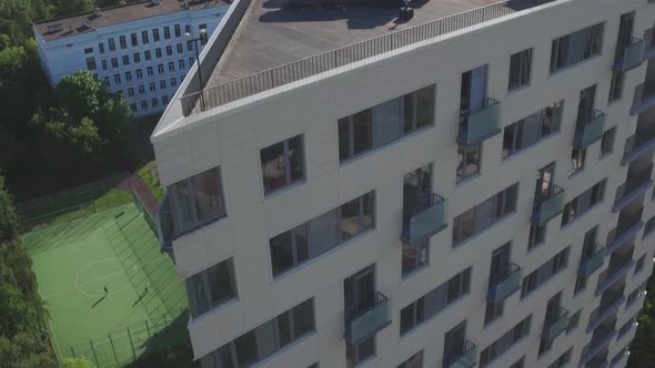 Drone Footage of Modern Large Apartment Building. Development Infrastructure City for Big Population alt