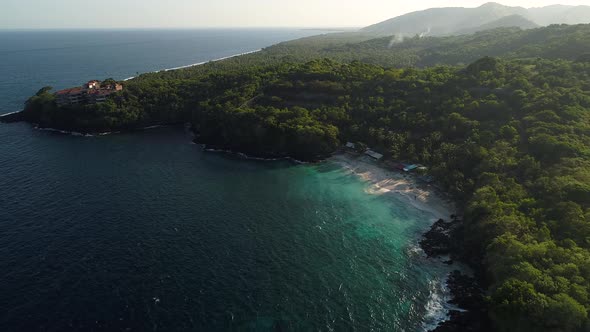 Beach on an Island in the Ocean in the Evening alt