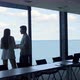 Business Team Discussing Ideas at Beautiful Sea View Window - VideoHive Item for Sale