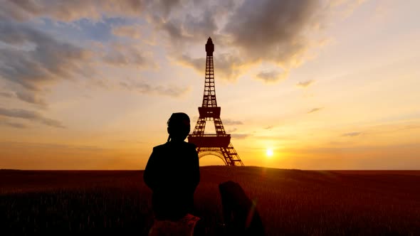 Child watching Eiffel Tower in Sunset View