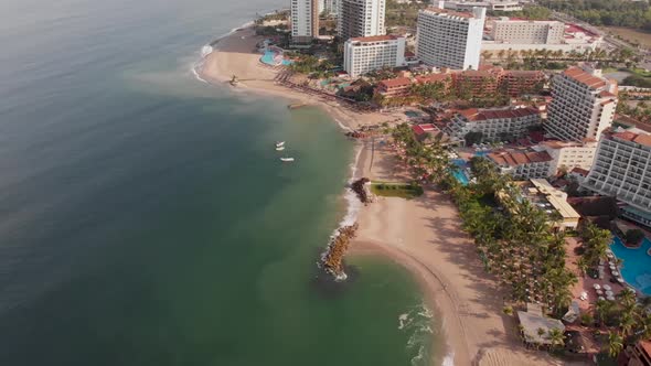 Aerial drone footage of the beautiful beach and coastal area of Puerto Vallarta in Mexico