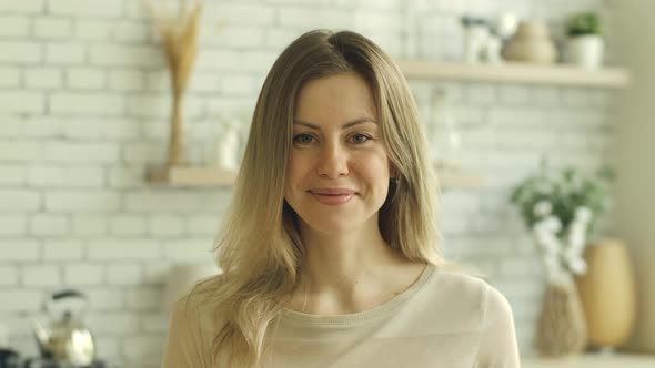 Smiling Happy Kind Blonde Girl Portrait with Mole on Face