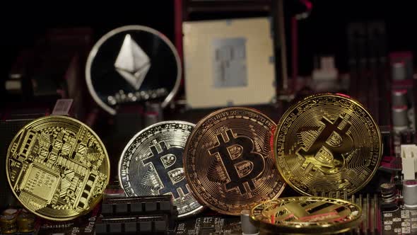 Bitcoin BTC Litecoin Ethereum Coins on Digital Computer Motherboard Cryptocurrency Mining alt
