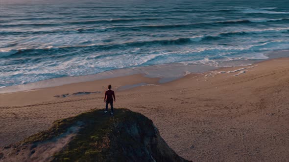 Man Standing On The Cliff alt