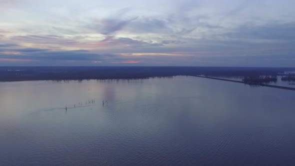 Aerial of Beautiful Coastal River Sunset In Winter alt