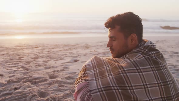 Portrait of a Caucasian man enjoying time at the beach alt