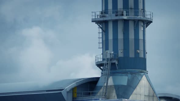 Steam Coming Out Of Refinery Building alt