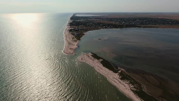 Aerial Shot of Semicircular Sand Line at the Black Sea Shoal on a Sunny Day in Summer