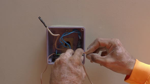 Electrical plug repairs and extension cords by a professional electrician. with equipment