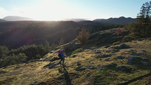 Aerial of a Male Hiker on a Rock Bluff Trail on Vancouver Island, Canada, Lone Tree Hill alt