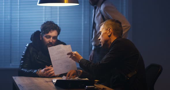 Policemen Interrogating a Drug Dealer alt