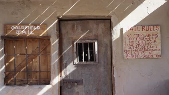 Old west jail front door with bars on windows alt