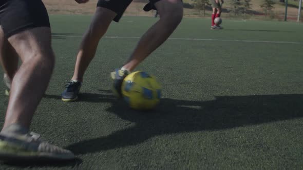 Soccer Player Legs Dribbling During Football Game alt