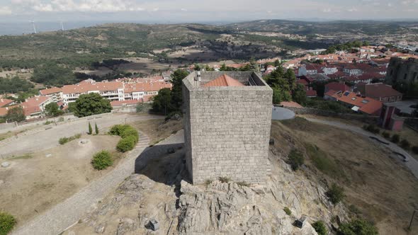 Drone orbit around ancient Guarda Castle reveals city of Guarda in background