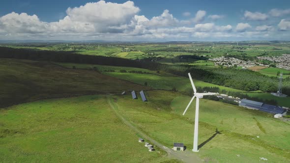 Ireland Wind Turbine Spin Aerial View Solar Panels on Green Valley alt
