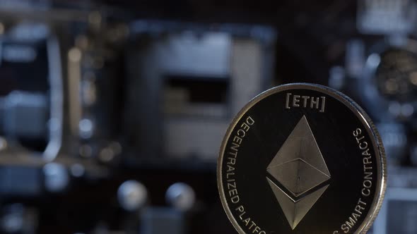 Ethereum Coin Spinning on Computer Motherboard Background Cryptocurrency Mining Virtual Money alt