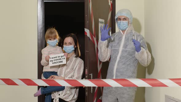 Medical Worker Visiting Family of Mother and Daughter at Home During Coronavirus Quarantine Lockdown alt