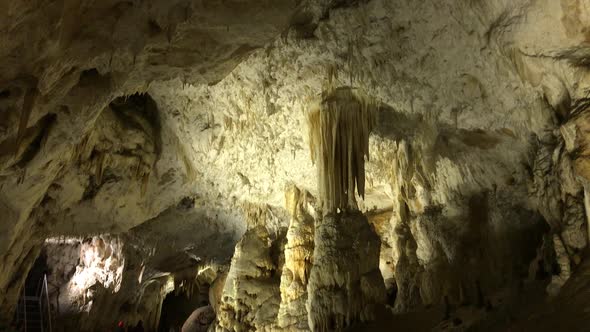 Hall deep inside underground  cavern slow tilt 1920X1080 HD footage - Cave formations of stalactites alt