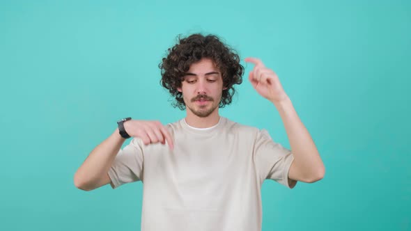 Positive Guy Pointing Down Saying to Subscribe Gesturing Ok and Like alt