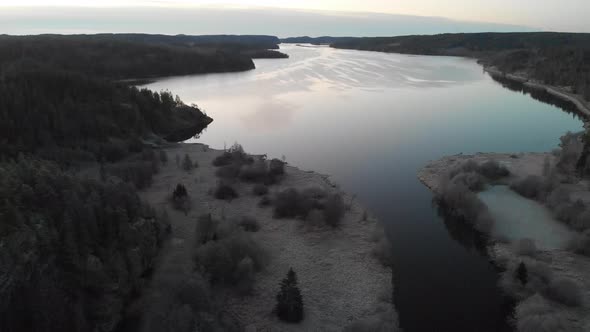 Lake Inlet Cold Early Morning Panoramic Aerial Establishing Shot alt
