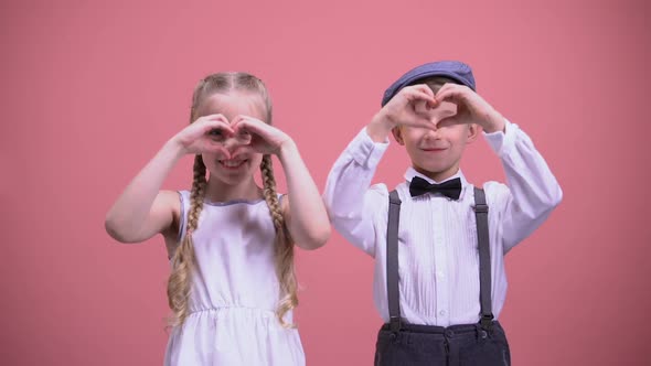 Cute Smiling Children Making Hearts With Their Hands, Celebrating Valentines Day alt
