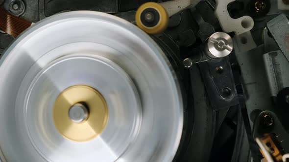 VCR VHS Mechanics Video Cassette Player Extreme Close Up Insert Tape Magnetic Head. Macro Footage alt