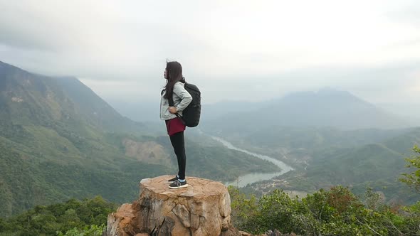 Woman At The Top Of Mountain alt
