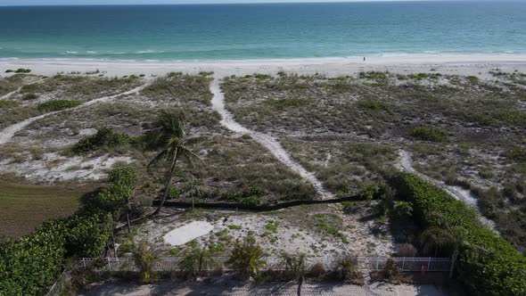low and slow aerial of beach house construction in Florida (2 of 2) alt