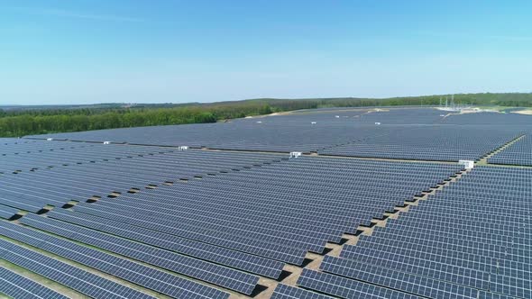Aerial View of Solar Power Station Field at Sunny Day. Aerial Top View of Solar Farm. Renewable alt