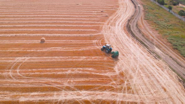  Impressive Flight Over a Working Combine Harvesting Tons of Ripe Barley alt