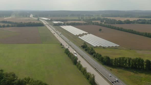 Aerial Shot of a Huge Complex of Solar Panels alt