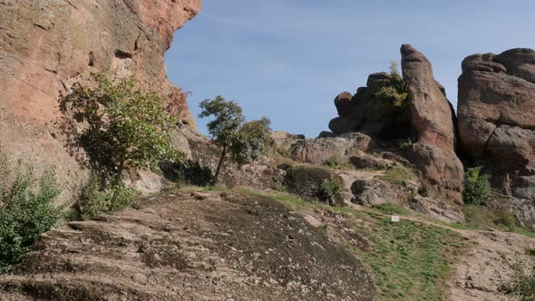 Group of strange  formations in Western Bulgaria 4K 2160p 30fps UltraHD footage - Slow tilt on Belog alt