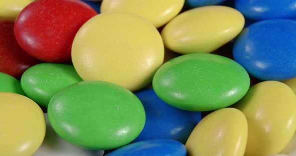 Sweets in the Form of Multicolored Pebbles Poured with Colored Glaze