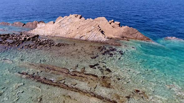 Small Islet Island Formed by the Accumulation of Rock Deposits Atop a Reef in the Sea