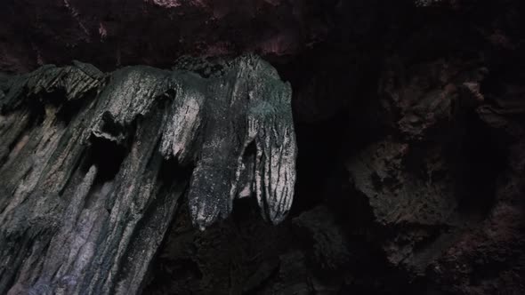 Underground Cave with Stalactite Rock Formations Hanging From Kuza Cave Ceiling alt