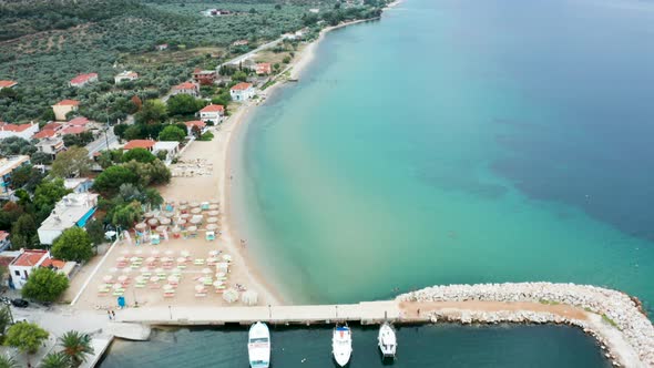 Drone Flying Over Beautiful Beach on the Coastline and Sea with Beautiful Turquoise alt