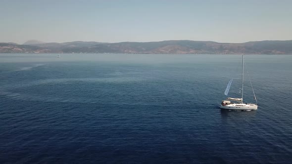 Aerial View of a Sailing Yacht Near the Greek Islands