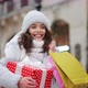 A Woman is Going to the City Center During a Snowfall - VideoHive Item for Sale