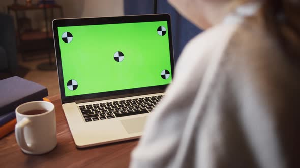 Happy Woman Communicating Using Laptop Computer at Home for Video Chatting with Friends Remote Work alt