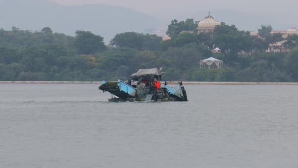 Ship Purifies Water and Collects Trash and Algae From the Water. Udaipur , Also Known As the City of alt